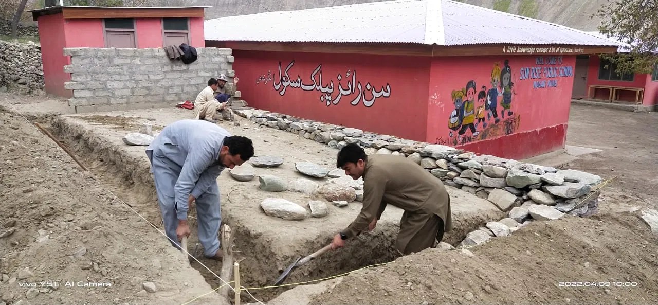 Workers laying the lab foundation